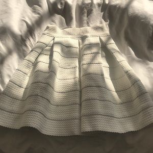 White knee length skirt
